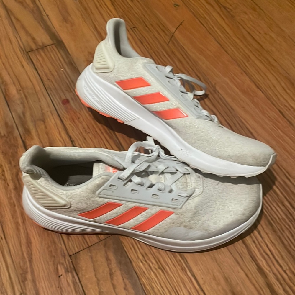 White and orange adidas’s